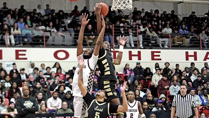 East Hartford senior Kehari Walker (right) scored a team-high 22 points in the team’s 69-65 CCC title win over the Windsor Warriors. 