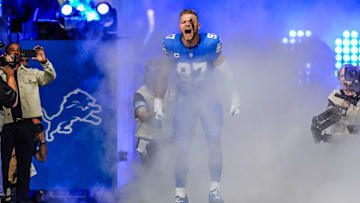 Detroit Lions' Aidan Hutchinson runs out of the tunnel during the Detroit Lions season opener against the Los Angeles Rams.