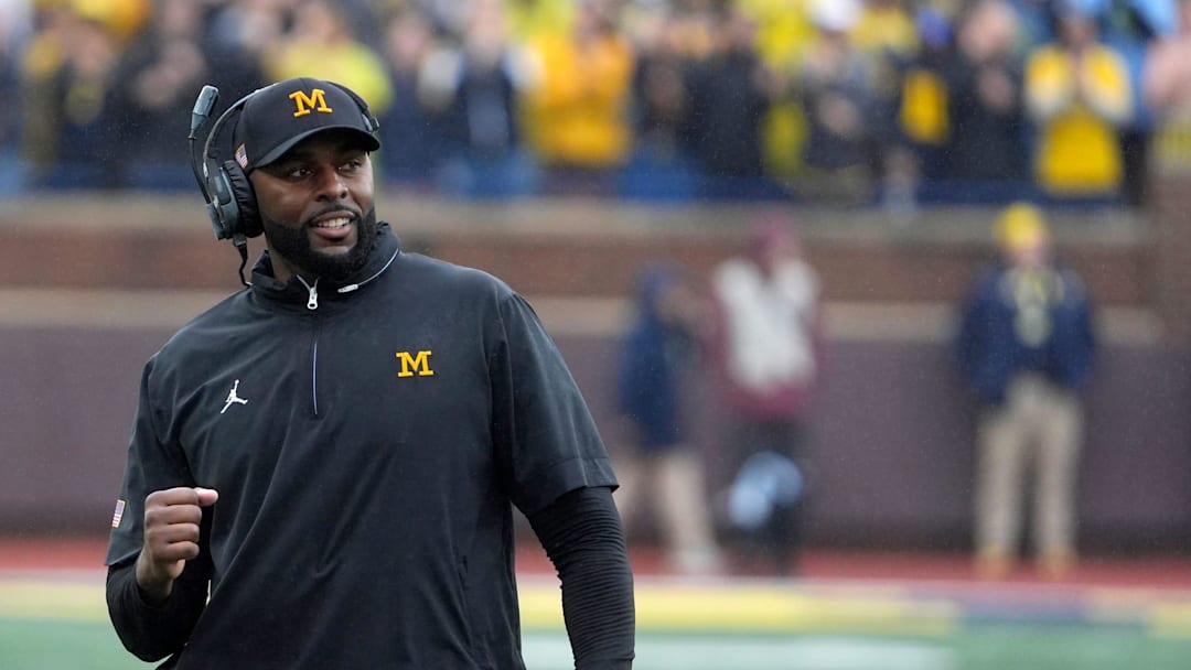 Michigan football coach Sherrone Moore celebrates a play during first-half action between Michigan and Minnesota at Michigan Stadium in Ann Arbor on Saturday, Sept. 28, 2024.