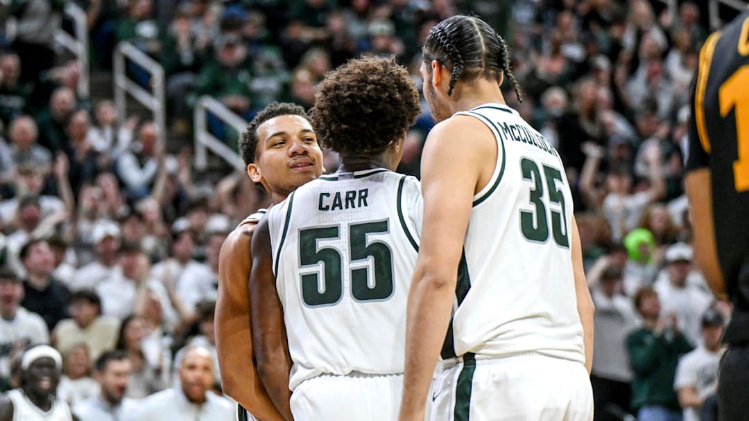 Michigan State's Divine Ugochukwu, Coen Carr and Jessee McCulloch