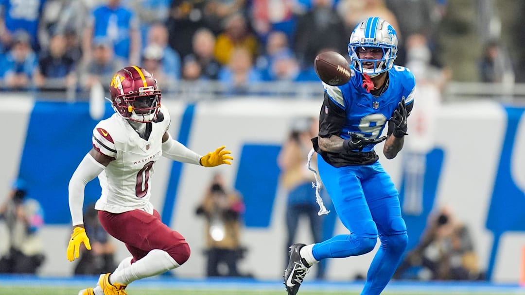 Detroit Lions wide receiver Jameson Williams looks to catch the ball against Washington Commanders cornerback Mike Sainristil in the first quarter in the NFC divisional round at Ford Field in Detroit on Saturday, Jan. 18, 2025.