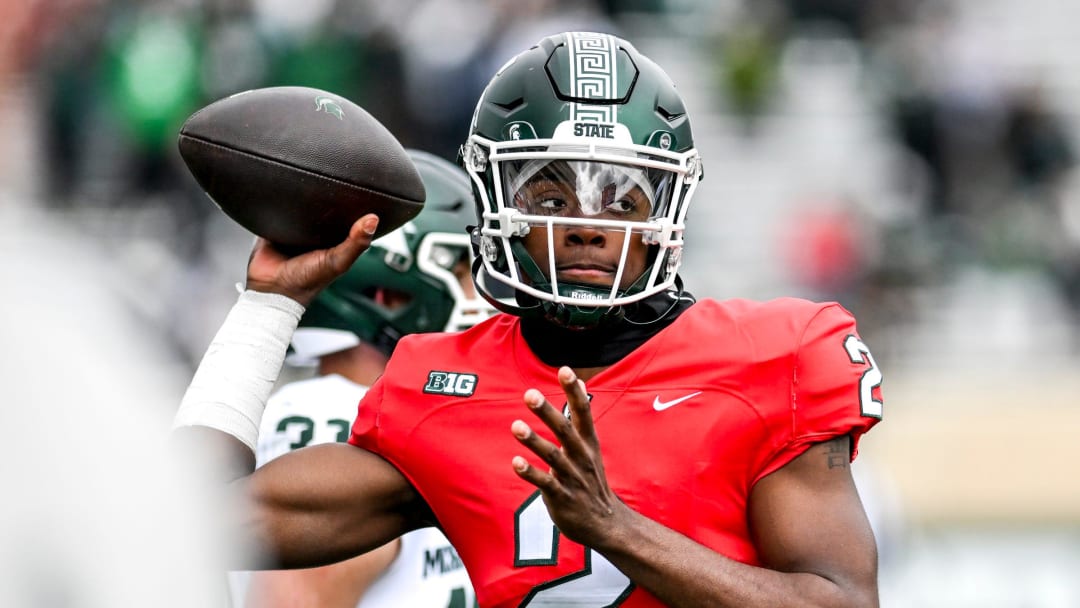 Michigan State's Aidan Chiles throws a pass at Spartan Stadium in East Lansing.