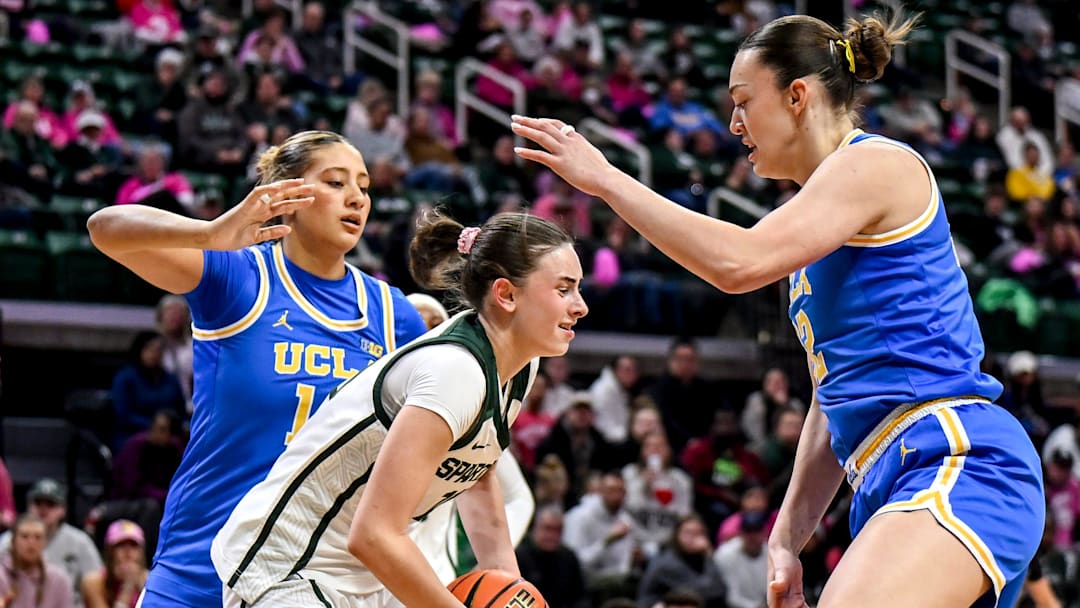 Michigan State's InŽs Sotelo, center, gets a rebound between UCLA's Sienna Betts, left, and Angela Dugalie, right, during the first quarter on Wednesday, Feb. 11, 2026, at the Breslin Center in East Lansing. Michigan State's InŽs Sotelo, center, gets a rebound between UCLA's Sienna Betts, left, and Angela Dugalie, right, during the first quarter on Wednesday, Feb. 11, 2026, at the Breslin Center in East Lansing.
