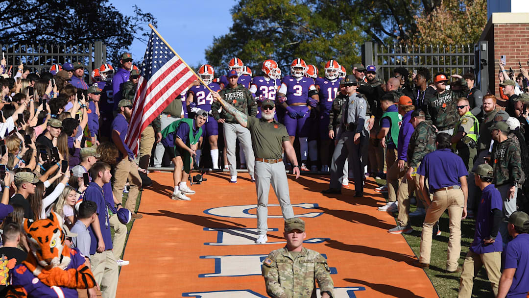 Nov 23, 2024; Clemson, South Carolina, USA; Clemson Tigers players get ready to run down the hill on Military Appreciation Day and Senior Day before a game against The Citadel Bulldogs at Memorial Stadium. Mandatory Credit: Ken Ruinard-Imagn Images
