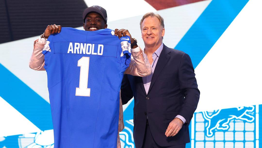 Terrion Arnold, a cornerback from the University of Alabama, shows off his Detroit Lions jersey with NFL commissioner Roger Goodell after he was picked in the first round of the 2024 NFL draft at the NFL draft theater in Detroit on Thursday, April 25, 2024. Terrion Arnold, a cornerback from the University of Alabama, shows off his Detroit Lions jersey with NFL commissioner Roger Goodell after he was picked in the first round of the 2024 NFL draft at the NFL draft theater in Detroit on Thursday, April 25, 2024.