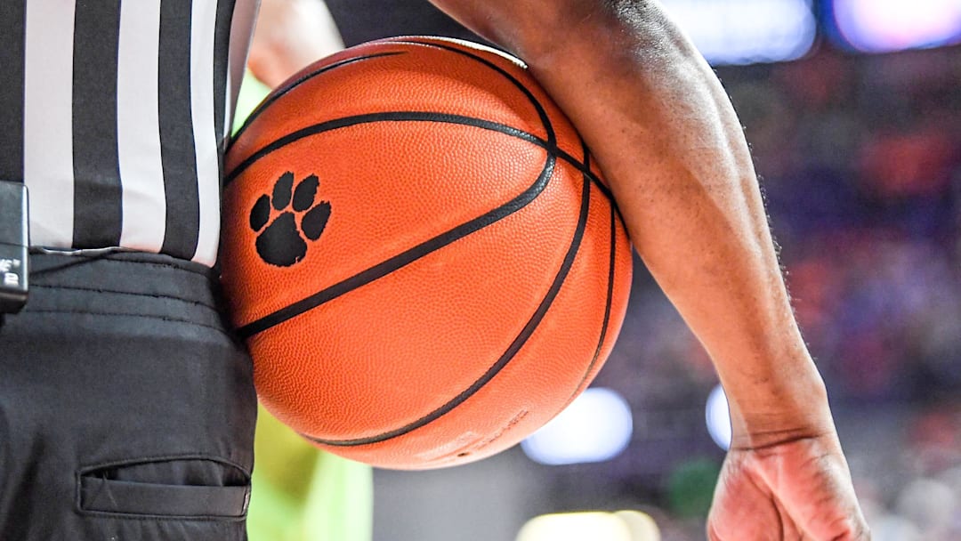 A referee holds a ball with a Clemson logo in a time out period during the first half at Littlejohn Coliseum Tuesday, Feb 8, 2022.

Ncaa Basketball North Carolina At Clemson