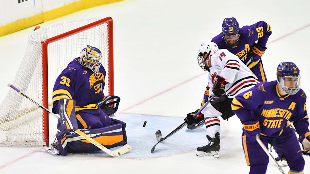 St. Cloud State's Zach Okabe takes a shot on goaltender Alex Tracy of MSU-Mankato during the first period of the game Saturday, Oct. 22, 2022, at the Herb Brooks National Hockey Center in St. Cloud.

Scsu Hock 14