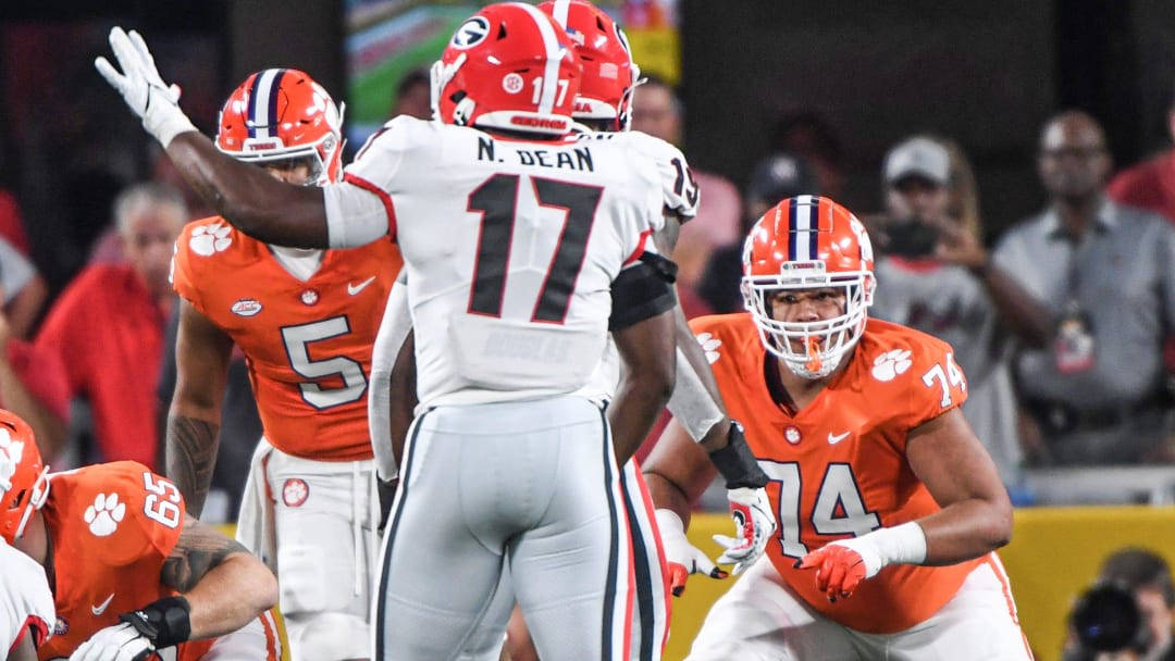 Clemson offensive lineman Marcus Tate(74) blocks for  quarterback D.J. Uiagalelei(5) during the first quarter of the Duke's Mayo Classic Sep 4, 2021; Charlotte, North Carolina, USA;  at Bank of America Stadium.

Ncaa Football Georgia At Clemson