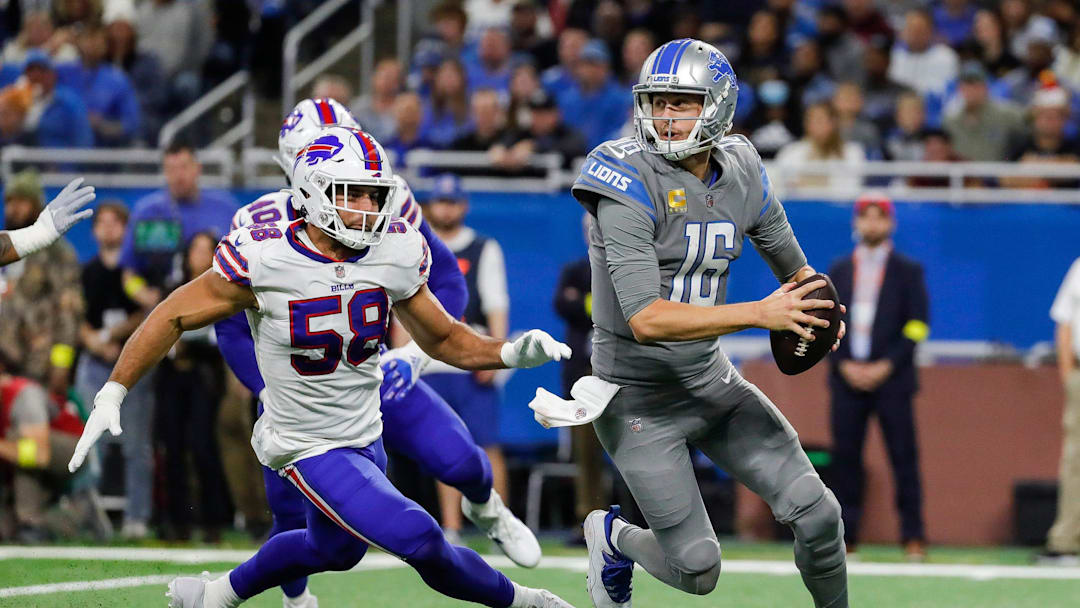 Detroit Lions quarterback Jared Goff (16) is chased by Buffalo Bills linebacker Matt Milano (58) during their game in 2022.