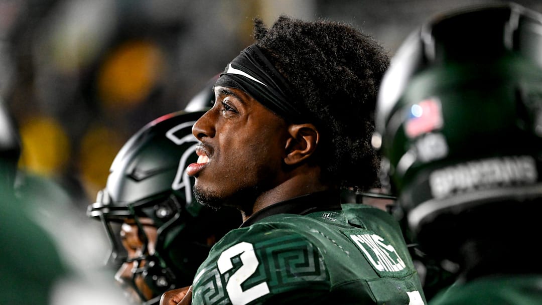 Michigan State's Aidan Chiles looks on from the sideline late during the fourth quarter in the game against Michigan on Saturday, Oct. 25, 2025, at Spartan Stadium in East Lansing.