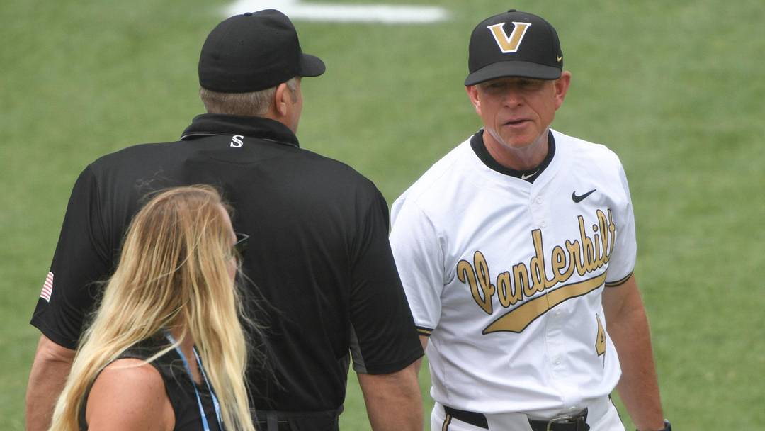 May 31, 2024; Clemson, SC, USA; Vanderbilt University Head Coach Tim Corbin talks with an umpire in the game against Coastal Carolina University during the first inning during the NCAA Clemson Regional baseball game at Doug Kingsmore Stadium. Mandatory Credit: Ken Ruinard-Imagn Images