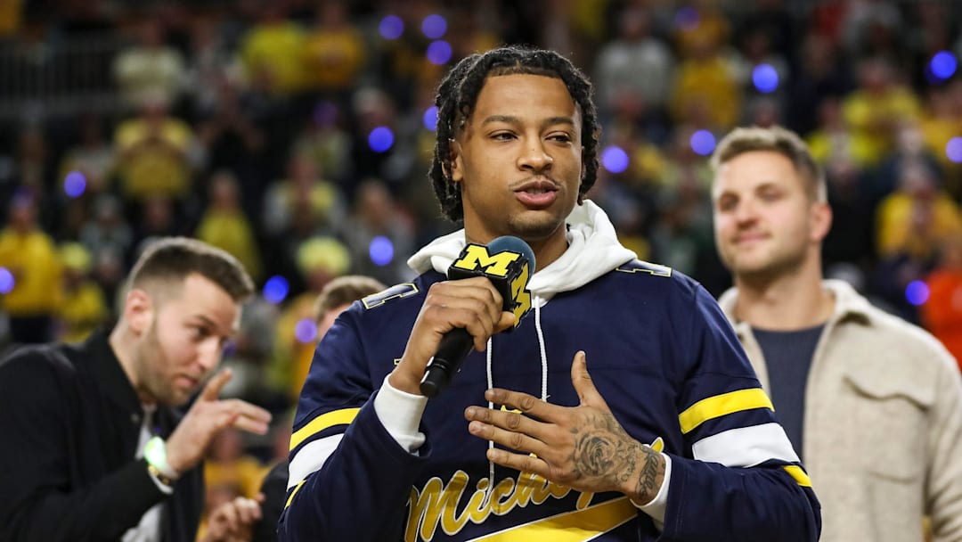 Trey Burke speaks during halftime as Michigan honors the 10-year anniversary of the 2013 run to the Final Four and national title game at Crisler Center in Ann Arbor on Saturday, Feb. 18, 2023.