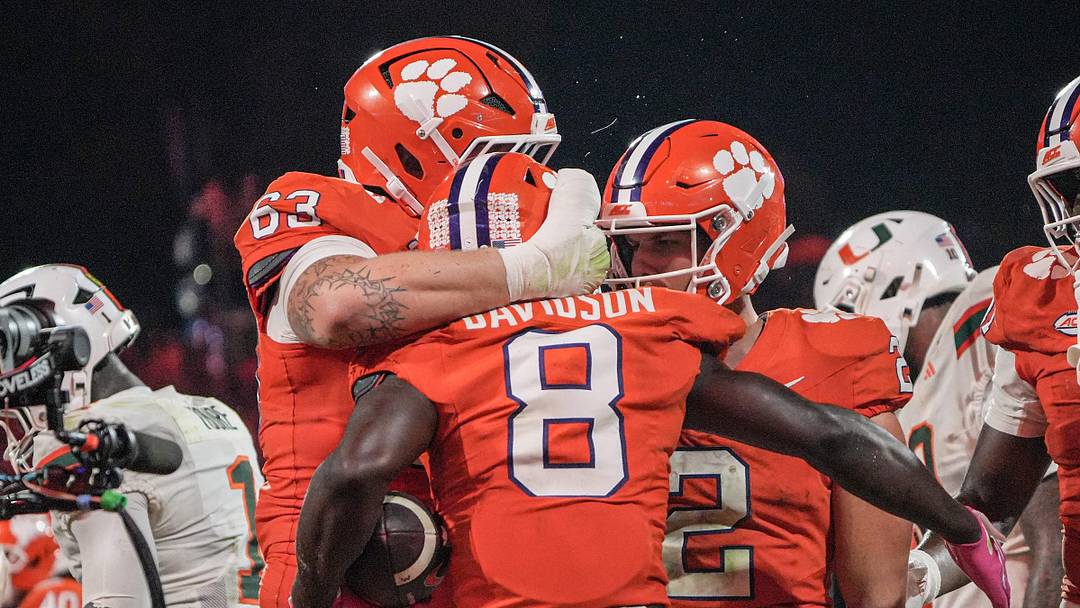 Clemson running back Gideon Davidson (8) celebrates his score with offensive lineman Easton Ware (63) and quarterback Tait Reynolds (2) in the game with Miami during the fourth quarter at Memorial Stadium Saturday, October 3, 2026.