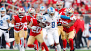 Detroit Lions wide receiver Jameson Williams (9) runs the ball past San Francisco 49ers linebacker Dre Greenlaw (57) in the first quarter of the NFC Championship game at Levi's Stadium in Santa Clara, Calif. on Sunday, January 28, 2024.