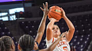 Nov 4, 2024; Clemson, SC, USA; Clemson guard Hannah Kohn (5) takes a shot near Jackson State University center Shalance Montoya (44) during the first quarter at Littlejohn Coliseum in Clemson, S.C. Monday, Nov 4, 2024.  Mandatory Credit: Ken Ruinard-USA TODAY NETWORK via Imagn Images