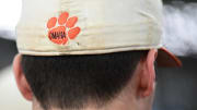 Clemson sophomore pitcher Davis Sharpe wears his hat with \"Omaha\" on the back, during batting practice at the first official team Spring practice at Doug Kingsmore Stadium in Clemson Friday, January 24, 2020