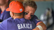 Clemson Head Coach Erik Bakich gets a hug from Clemson outfielder Cam Cannarella (10) after the NCAA baseball Clemson Regional at Doug Kingsmore Stadium in Clemson, S.C. Sunday, June 1, 2025. Kentucky won 16-4, ending Clemson's season.