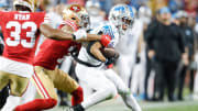 Lions wide receiver Amon-Ra St. Brown makes a catch against 49ers cornerback Charvarius Ward during the NFC Championship game.