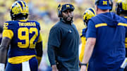 Michigan head coach Sherrone Moore talks to players at a timeout against USC during the second half at Michigan Stadium in Ann Arbor on Saturday, Sept. 21, 2024.