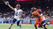 Southfield A&T wide receiver DaMario Quarles runs for a touchdown against Belleville during the second half of the Division 1 state final at Ford Field in Detroit on Sunday, Nov. 26, 2023.