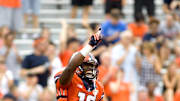 Sep 5, 2015; Champaign, IL, USA;  Marchie Murdock (16) celebrates a touchdown catch with teammates Illinois Fighting Illini wide receiver Malik Turner (11) and offensive lineman Chris Boles at Memorial Stadium. Mandatory Credit: Mike Granse-Imagn Images