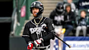 Lugnuts' Tommy White prepares to bat against Michigan State in the first inning on Tuesday, April 1, 2025, during the Crosstown Showdown at Jackson Field in Lansing.