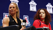 Oct 21, 2025; Kansas City, MO, USA; Arizona head coach Becky Burke (left) and Mickayla Perdue (right) speaks to media during Big 12 Womenís Basketball Media Day at T-Mobile Center. Mandatory Credit: Sophia Scheller-Imagn Images
