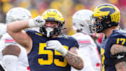 Michigan defensive lineman Mason Graham celebrates a tackle against Ohio State during the second half at Michigan Stadium in Ann Arbor on Saturday, Nov. 25, 2023.