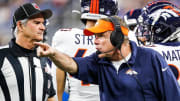 Denver Broncos head coach Sean Payton talks to a referee during the second half against the Detroit