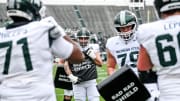 Michigan State's offensive line runs a drill during the Spring Showcase on Saturday, April 20, 2024, at Spartan Stadium in East Lansing.