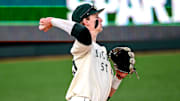Michigan State's Randy Seymour fields a ball hit by the Lugnuts in the first inning on Tuesday, April 1, 2025, during the Crosstown Showdown at Jackson Field in Lansing.