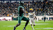 Michigan State's Nick Marsh catches a pass at the goal line against Michigan during the fourth quarter on Saturday, Oct. 25, 2025, at Spartan Stadium in East Lansing.