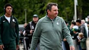 Michigan State's head coach Jonathan Smith walks past fans before the football game against Boston College on Saturday, Sept. 6, 2025, at Spartan Stadium in East Lansing.