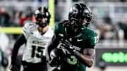 Michigan State's Ademola Faleye runs after a catch against Purdue during the first quarter on Friday, Nov. 22, 2024, at Spartan Stadium in East Lansing.