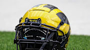 A Michigan football helmet on the sideline during open practice at NRG Stadium in Houston, Texas on Saturday, Jan. 6, 2024.