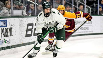 Michigan State's Joey Larson moves the puck against Minnesota during the second period on Saturday, Jan. 25, 2025, at Munn Arena in East Lansing.