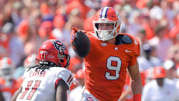 Sep 21, 2024; Clemson, South Carolina, USA; Clemson Tigers tight end Jake Briningstool (9) points for a first down against North Carolina State Wolfpack safety Ja'Had Carter (11) during the first quarter at Memorial Stadium. Mandatory Credit: Ken Ruinard-Imagn Images