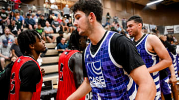 Michigan State and Team Case Credit Union's Frankie Fidler shakes hands with Team Goodfellas players after the game on Tuesday, June 25, 2024, during the Moneyball Pro-Am at Holt High School.