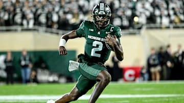 Michigan State's Aidan Chiles runs for a gain against Iowa in the second quarter on Saturday, Oct. 19, 2024, at Spartan Stadium in East Lansing.