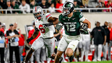 Michigan State's Jack Velling, right, runs after a catch as Ohio State's Sonny Styles closes in during the second quarter on Saturday, Sept. 28, 2024, at Spartan Stadium in East Lansing.
