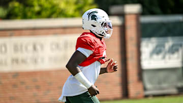Michigan State's Aidan Chiles runs back after a drill during football practice on Monday, Aug. 11, 2025, in East Lansing.