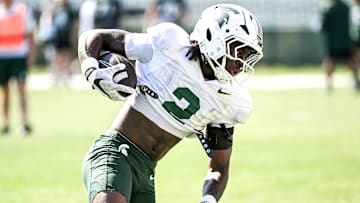 Michigan State's Aydan West runs with the ball during football practice on Monday, Aug. 11, 2025, in East Lansing.