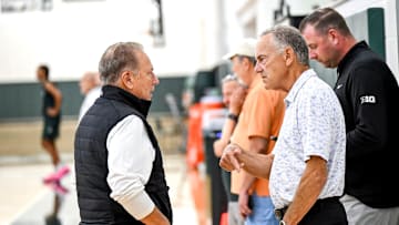 Michigan State's coach Tom Izzo, left, talks with former football head coach Mark Dantonio during the first day of basketball practice on Monday, Sept. 22, 2025, at the Breslin Center in East Lansing.