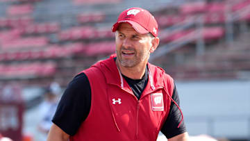Wisconsin Badgers defensive Coordinator Mike Tressel runs through a drill during fall training camp at Camp Randall Stadium in Madison on Thursday, Aug. 10, 2023.