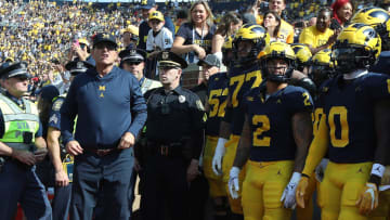Sept. 23, 2023: Michigan coach Jim Harbaugh waits to take the field before a 31-7 win over Rutgers.