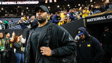 Michigan offensive coordinator Sherrone Moore arrives for the national championship game at NRG