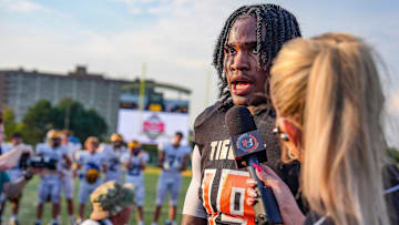 Belleville QB Bryce Underwood is interviewed after defeating Clarkston during the 2024 Xenith Prep Kickoff Classic at Wayne State's Tom Adams Field in Detroit on Friday, Aug. 30, 2024.