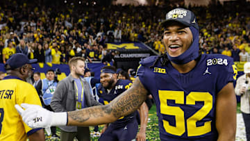 Michigan defensive end Kechaun Bennett (52) celebrates after the 34-13 win over Washington to win the national championship at NRG Stadium in Houston on Monday, Jan. 8, 2024.