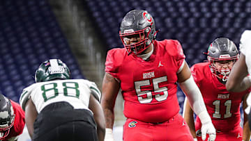 Toledo Central Catholic defensive lineman Marc Nave get in position before a play against Detroit Cass Tech during the second half of CHSL Prep Bowl at Ford Field in Detroit on Saturday, Oct. 21, 2023.