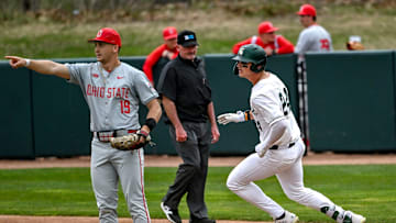 Michigan State's Sam Busch, right, gets to first base after a hit against Ohio State during the fourth inning on Friday, April 18, 2025, at McLane Stadium in East Lansing.